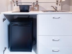 A kitchen or kitchenette at Le Stanze di Gianmarmo - Via di Mezzo