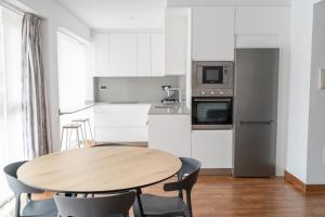 Kuchyňa alebo kuchynka v ubytovaní Ornis Apartments Poble