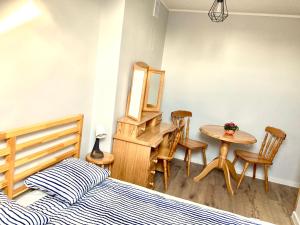 Ein Bett oder Betten in einem Zimmer der Unterkunft Insko Home & Sauna