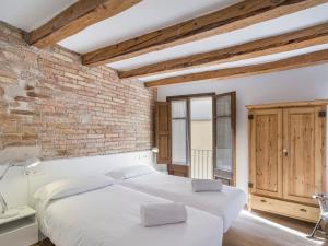 Postel nebo postele na pokoji v ubytování Cal Rellotger de Solsona