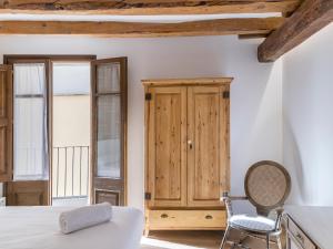Postel nebo postele na pokoji v ubytování Cal Rellotger de Solsona