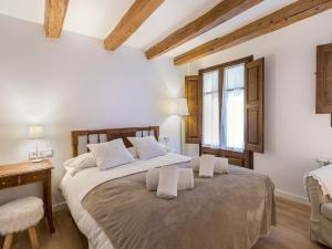Postel nebo postele na pokoji v ubytování Cal Rellotger de Solsona