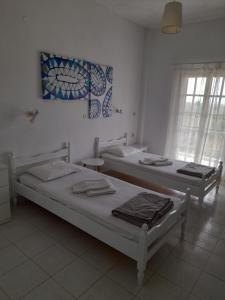 Postel nebo postele na pokoji v ubytování Olive terra holiday aparments
