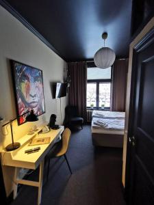 Postel nebo postele na pokoji v ubytování Hotell Temperance