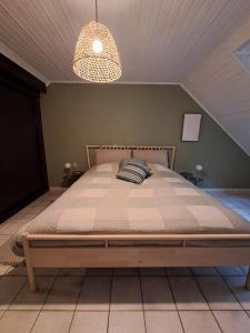Postelja oz. postelje v sobi nastanitve Le Louis Vakantiehuis