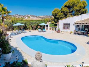 Bazén v ubytovaní 1-Bed Apartment close to Moraira town centre alebo v jeho blízkosti