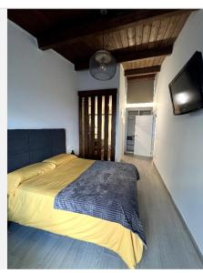 Casa Duas Uves tesisinde bir odada yatak veya yataklar