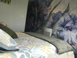 Postel nebo postele na pokoji v ubytování Mon TAJ MAHAL