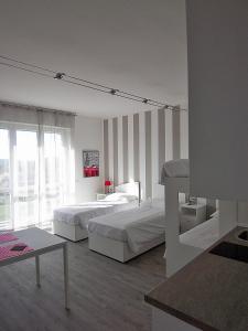 Katil atau katil-katil dalam bilik di B&B Vinago Belvedere
