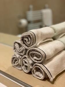 a pile of towels sitting on top of a counter at Lomond View in Luss