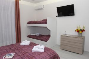 Postel nebo postele na pokoji v ubytování PONTE VALLE B&B POMPEI