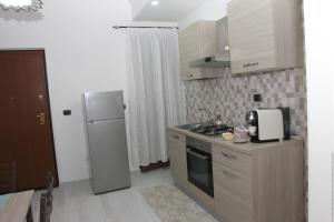 Kuchyň nebo kuchyňský kout v ubytování PONTE VALLE B&B POMPEI