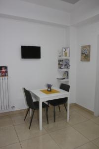 TV a/nebo společenská místnost v ubytování PONTE VALLE B&B POMPEI