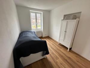 Posteľ alebo postele v izbe v ubytovaní Traunkai Apartments Bad Ischl