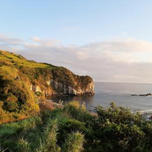 a view of a beach with the ocean at Casa da Praia dos Moinhos in Ribeira Grande