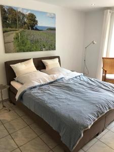 Postel nebo postele na pokoji v ubytování Ferienwohnung am Mühlenpark