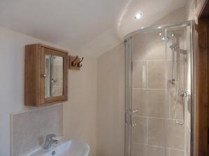 a bathroom with a shower and a sink at Mile House Barn Bed & Breakfast in Nantwich