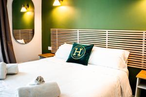 A bed or beds in a room at Ancha Village