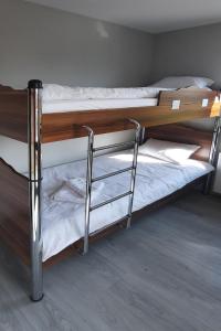 Postel nebo postele na pokoji v ubytování Zora