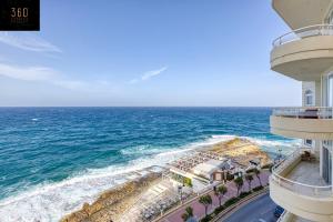 an aerial view of the ocean from a building at Tower Road Sliema, 4BR APT with sensational views by 360 Estates in Sliema