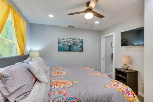 a bedroom with a bed and a ceiling fan at Quiet Mount Vernon Escape Fish, Hike and Unwind! in Mount Vernon