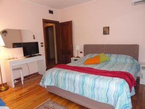 Letto o letti in una camera di HOUSE DOLCEVITA 30 min per Venezia