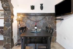 Telewizja i/lub zestaw kina domowego w obiekcie La Casita de Vals
