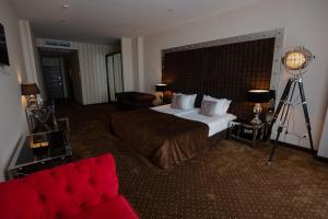 Кровать или кровати в номере Marine Residence Sea View