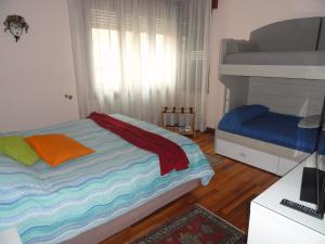 Letto o letti in una camera di HOUSE DOLCEVITA 30 min per Venezia