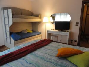 Letto o letti in una camera di HOUSE DOLCEVITA 30 min per Venezia