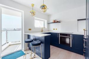 Η κουζίνα ή μικρή κουζίνα στο Sunny View +10 φωτογραφίες