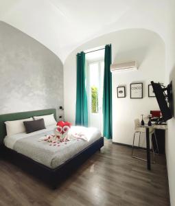 Posteľ alebo postele v izbe v ubytovaní Chroma Italy - Chroma Deka