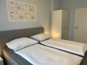 Postel nebo postele na pokoji v ubytování Ferienwohnungen Kusche
