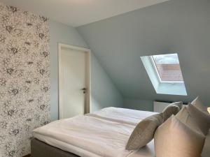 Postel nebo postele na pokoji v ubytování Ferienwohnungen Kusche