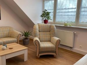 Posezení v ubytování Ferienwohnungen Kusche