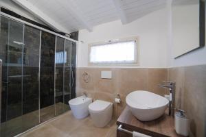 Kúpeľňa v ubytovaní Villa Le Mimose