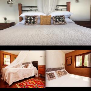 a bedroom with a white bed with pillows at Todo se transforma in Cuchilla Alta