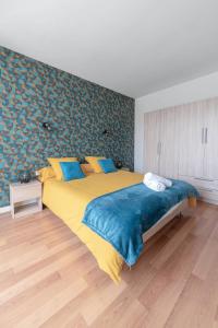 Postel nebo postele na pokoji v ubytování Le Pasteur - Grand appartement lumineux - Centre-ville