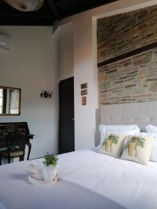 Ένα ή περισσότερα κρεβάτια σε δωμάτιο στο Maronia Luxury Villa