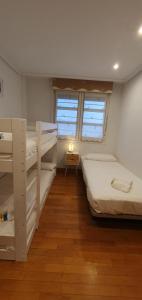 A bed or beds in a room at Berlín - Basquenjoy