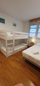 A bed or beds in a room at Berlín - Basquenjoy Még 26 kép