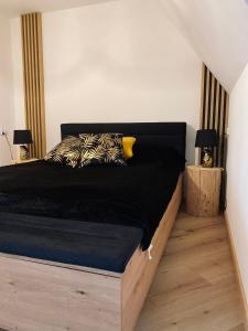 Łóżko lub łóżka w pokoju w obiekcie LaKris