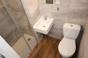 Ένα μπάνιο στο Apartamenty Listopadowe