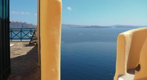 a view of the water from a building at Oia VineyART Homes in Oia