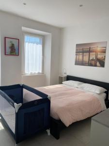 A bed or beds in a room at Casa Cesira
