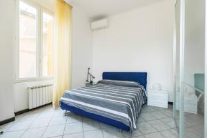 Letto o letti in una camera di 099 A due passi dal mare
