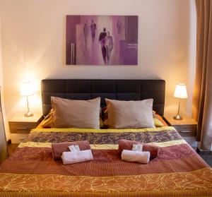 Hotel Rychta Netolice tesisinde bir odada yatak veya yataklar