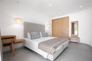 Tempat tidur dalam kamar di Ancora Park - Sunplace Hotels & Resorts