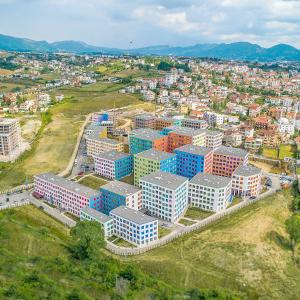 an aerial view of a large city with buildings at Modern apartment in Tirana in Tirana