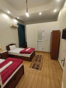 Postel nebo postele na pokoji v ubytování Miami Hotel